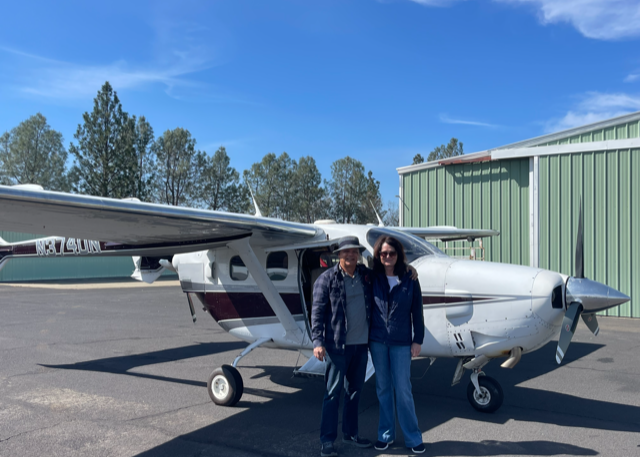 IMG_1955 CSF Founders Dan and Brenda posing front of an airplane